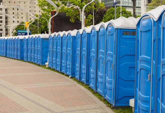 a row of sleek and modern portable restrooms at a special outdoor event in Banning